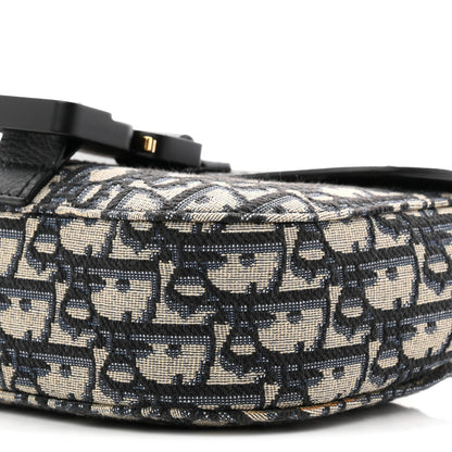 Grained Calfskin Oblique Mini Saddle Messenger Bag With Flap Beige Black
