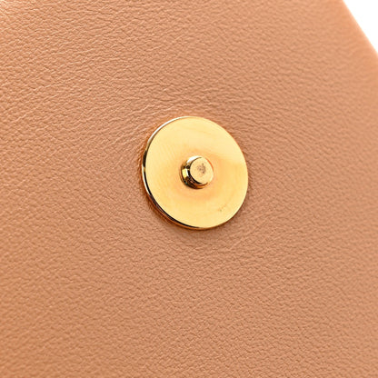 Lambskin Embossed Monogram Pochette Coussin Camel