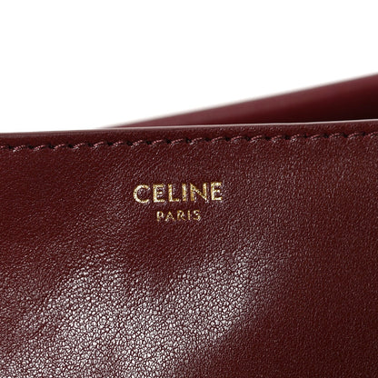Shiny Lambskin Soft Triomphe Half Moon Bag Syrah