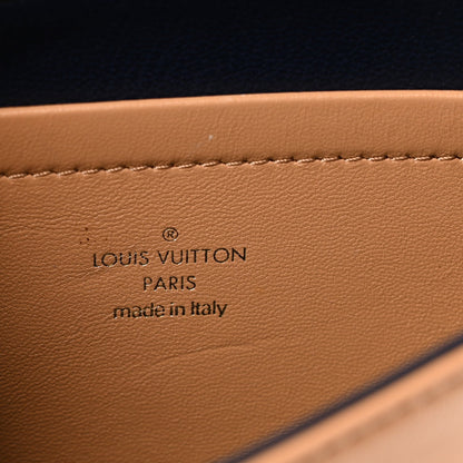 Lambskin Embossed Monogram Pochette Coussin Camel