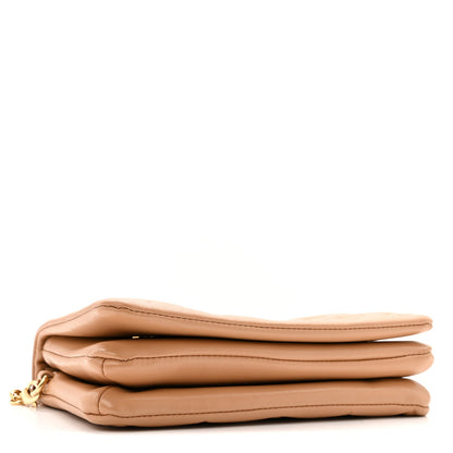 Lambskin Embossed Monogram Pochette Coussin Camel