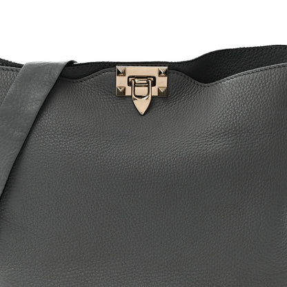 Pebbled Calfskin Small Rockstud Flip-Lock Messenger Bag Light Stone
